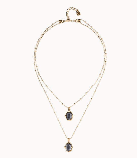 Collar doble bañado en oro 18k con dos cristales facetados ovalados negros